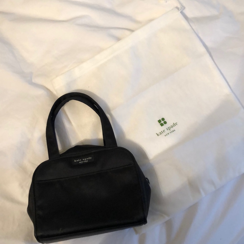 Black Kate Spade top handle bag with zipper!
